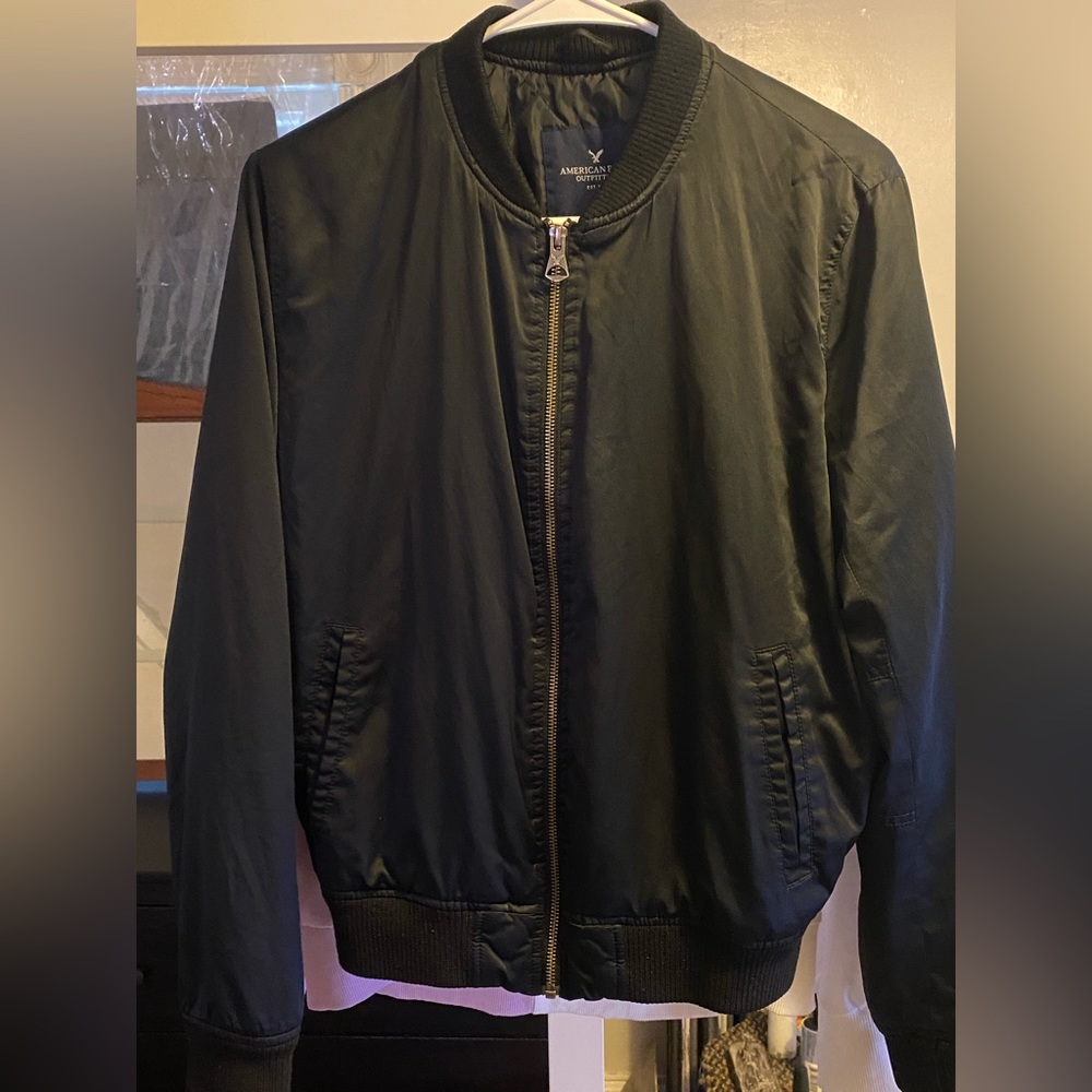 Still in GREAT shape, all black with bronze zipper.